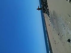 wanking on public beach