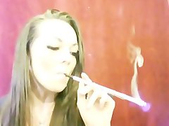 Layla smoking all white in holder whit luscious dangles