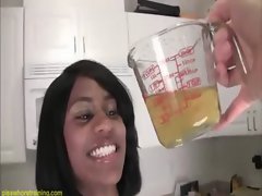 Ebony young lady pissed in the bowl and drank it
